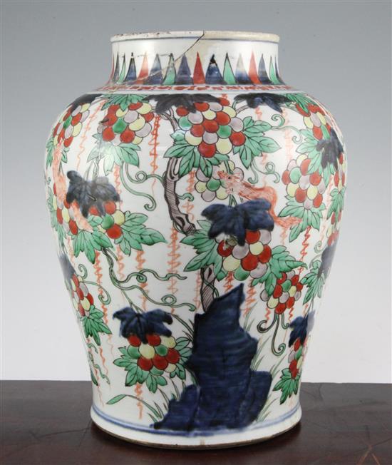 A Chinese wucai baluster jar, 17th century, 32cm., broken and restored
